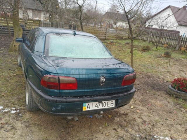 Зеленый Опель Омега, объемом двигателя 2 л и пробегом 350 тыс. км за 1700 $, фото 2 на Automoto.ua