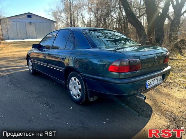 Зелений Опель Омега, об'ємом двигуна 2 л та пробігом 400 тис. км за 1700 $, фото 9 на Automoto.ua