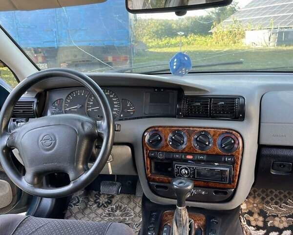 Зеленый Опель Омега, объемом двигателя 2 л и пробегом 350 тыс. км за 2100 $, фото 16 на Automoto.ua