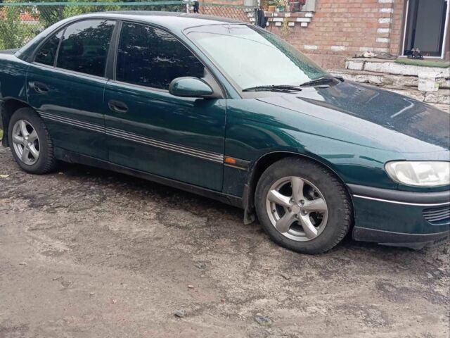 Зеленый Опель Омега, объемом двигателя 2 л и пробегом 350 тыс. км за 1900 $, фото 3 на Automoto.ua
