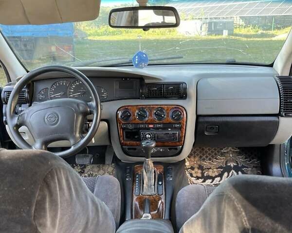 Зеленый Опель Омега, объемом двигателя 2 л и пробегом 350 тыс. км за 2100 $, фото 14 на Automoto.ua