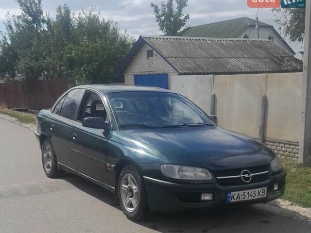 Зеленый Опель Омега, объемом двигателя 2 л и пробегом 350 тыс. км за 1950 $, фото 5 на Automoto.ua