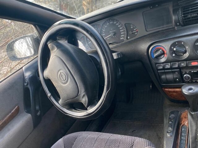 Зеленый Опель Омега, объемом двигателя 2.5 л и пробегом 20 тыс. км за 1763 $, фото 5 на Automoto.ua