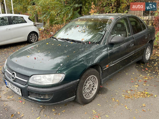 Зеленый Опель Омега, объемом двигателя 2 л и пробегом 350 тыс. км за 999 $, фото 2 на Automoto.ua
