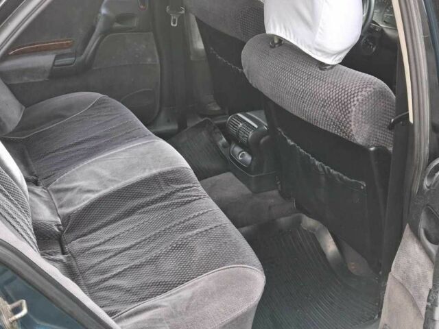 Зелений Опель Омега, об'ємом двигуна 2 л та пробігом 180 тис. км за 650 $, фото 8 на Automoto.ua