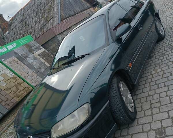 Зеленый Опель Омега, объемом двигателя 2.5 л и пробегом 400 тыс. км за 2150 $, фото 1 на Automoto.ua