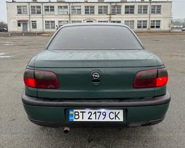 Зелений Опель Омега, об'ємом двигуна 2 л та пробігом 230 тис. км за 1400 $, фото 3 на Automoto.ua