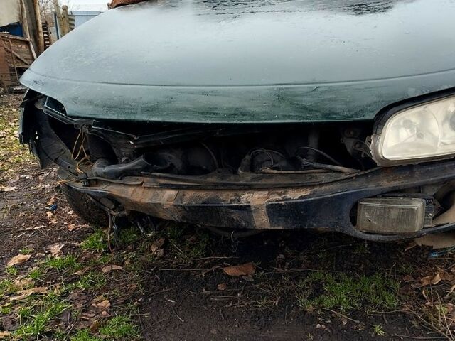 Зеленый Опель Омега, объемом двигателя 2.5 л и пробегом 370 тыс. км за 1050 $, фото 7 на Automoto.ua