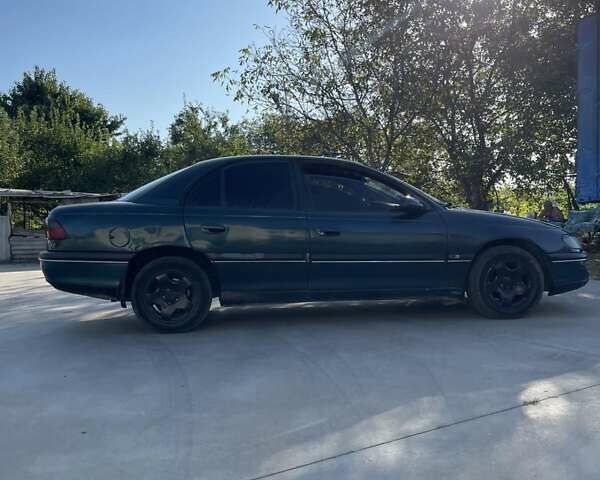 Зеленый Опель Омега, объемом двигателя 2 л и пробегом 300 тыс. км за 1800 $, фото 8 на Automoto.ua