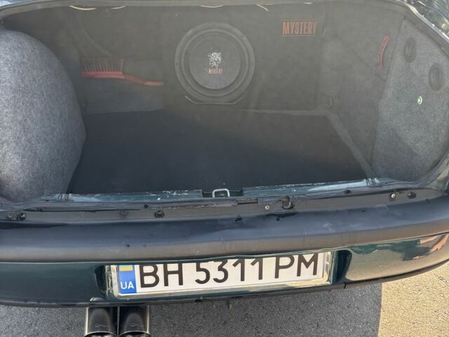 Зеленый Опель Омега, объемом двигателя 2.5 л и пробегом 300 тыс. км за 2500 $, фото 12 на Automoto.ua