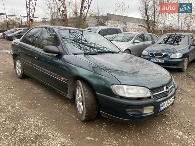 Зелений Опель Омега, об'ємом двигуна 2 л та пробігом 300 тис. км за 1300 $, фото 4 на Automoto.ua