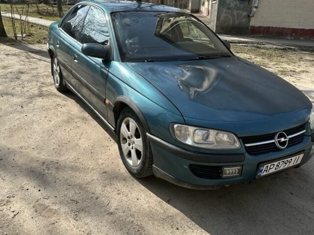 Зеленый Опель Омега, объемом двигателя 2 л и пробегом 302 тыс. км за 3000 $, фото 2 на Automoto.ua