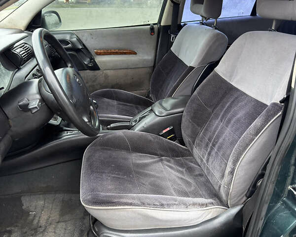 Зелений Опель Омега, об'ємом двигуна 2 л та пробігом 230 тис. км за 1400 $, фото 9 на Automoto.ua