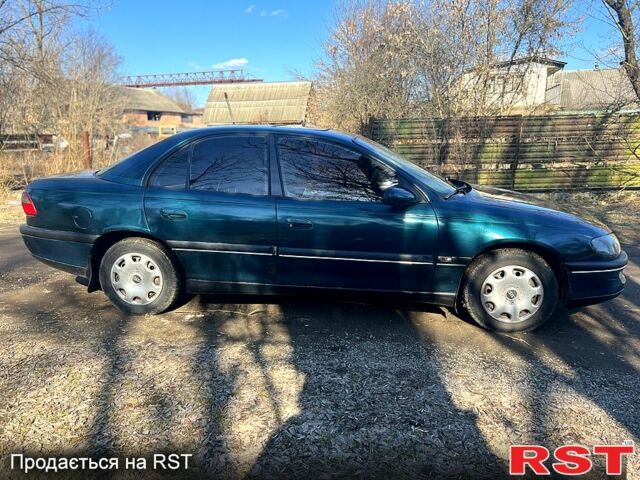 Зелений Опель Омега, об'ємом двигуна 2 л та пробігом 400 тис. км за 1700 $, фото 5 на Automoto.ua