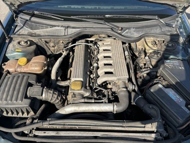 Зеленый Опель Омега, объемом двигателя 2.5 л и пробегом 300 тыс. км за 2500 $, фото 14 на Automoto.ua