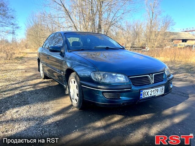 Зелений Опель Омега, об'ємом двигуна 2 л та пробігом 400 тис. км за 1700 $, фото 4 на Automoto.ua