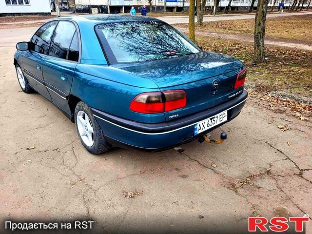 Зеленый Опель Омега, объемом двигателя 2 л и пробегом 350 тыс. км за 2100 $, фото 4 на Automoto.ua