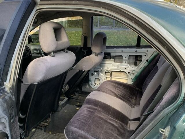 Зелений Опель Омега, об'ємом двигуна 2 л та пробігом 250 тис. км за 1300 $, фото 5 на Automoto.ua