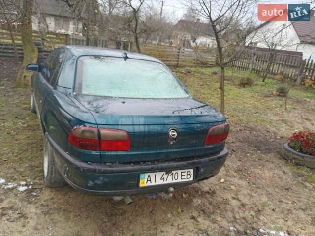 Зеленый Опель Омега, объемом двигателя 2 л и пробегом 350 тыс. км за 1700 $, фото 1 на Automoto.ua