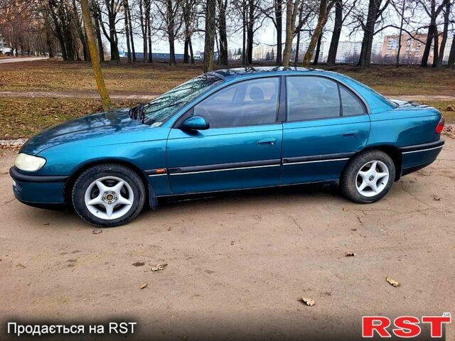 Зеленый Опель Омега, объемом двигателя 2 л и пробегом 350 тыс. км за 2100 $, фото 1 на Automoto.ua