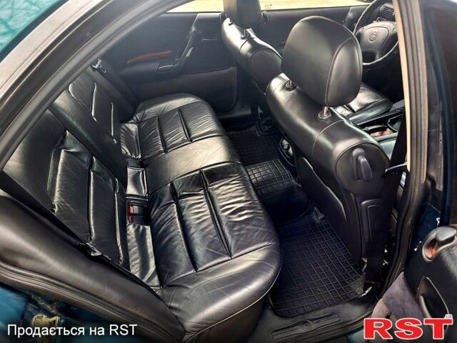 Зеленый Опель Омега, объемом двигателя 2 л и пробегом 350 тыс. км за 2100 $, фото 6 на Automoto.ua