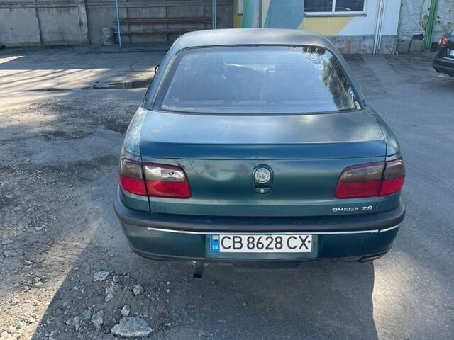 Зеленый Опель Омега, объемом двигателя 2 л и пробегом 474 тыс. км за 1200 $, фото 4 на Automoto.ua