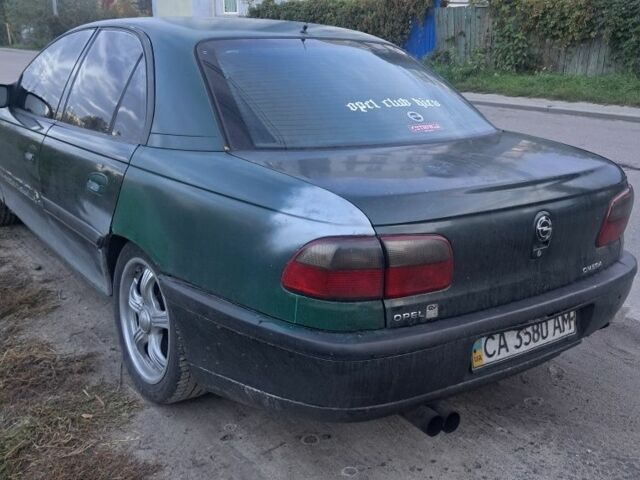 Зеленый Опель Омега, объемом двигателя 2 л и пробегом 390 тыс. км за 400 $, фото 2 на Automoto.ua