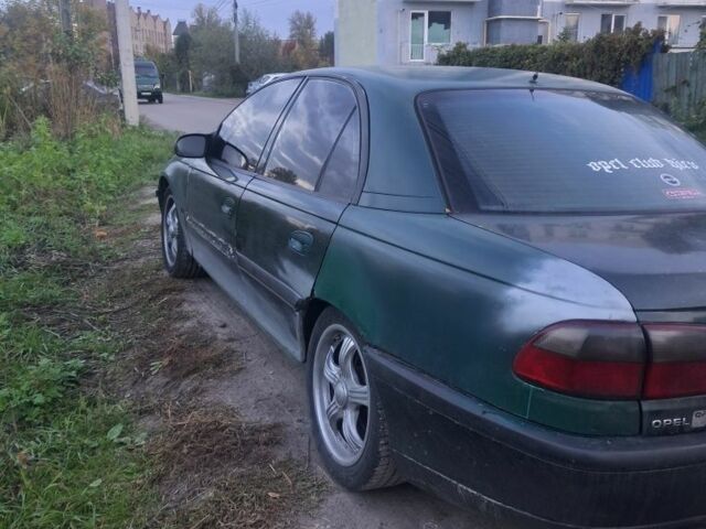 Зеленый Опель Омега, объемом двигателя 2 л и пробегом 390 тыс. км за 400 $, фото 1 на Automoto.ua