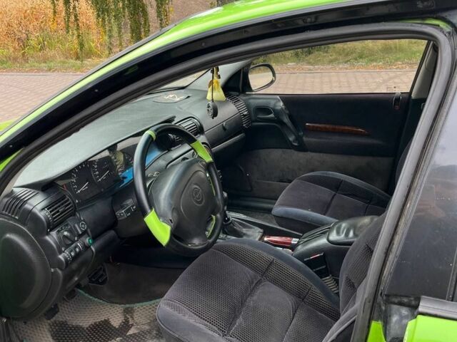 Зелений Опель Омега, об'ємом двигуна 3 л та пробігом 345 тис. км за 1900 $, фото 8 на Automoto.ua