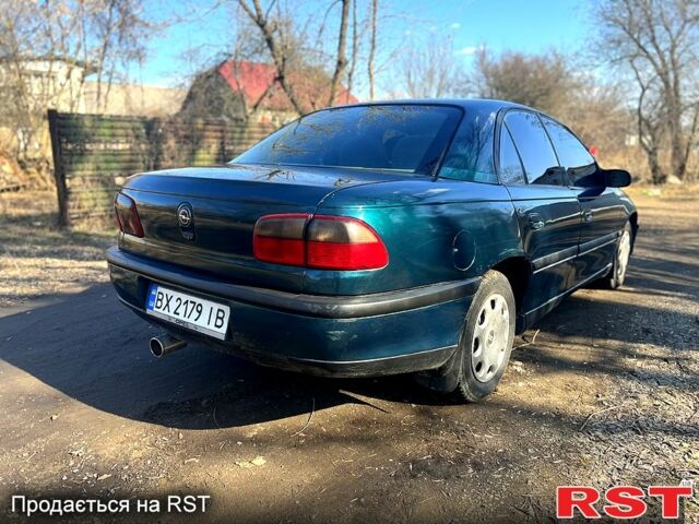 Зелений Опель Омега, об'ємом двигуна 2 л та пробігом 400 тис. км за 1700 $, фото 6 на Automoto.ua