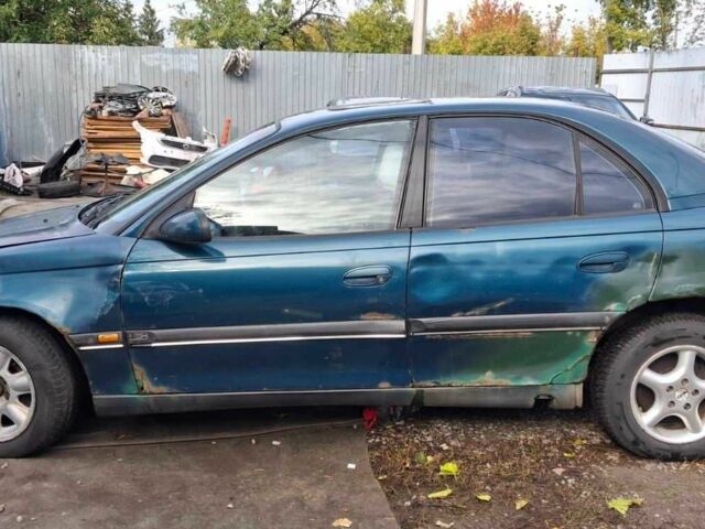 Зелений Опель Омега, об'ємом двигуна 2 л та пробігом 180 тис. км за 650 $, фото 5 на Automoto.ua