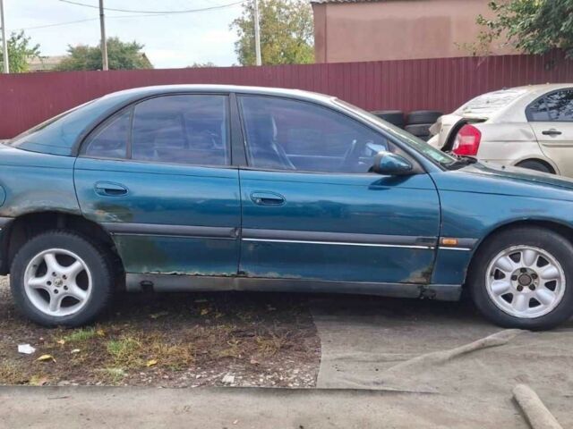 Зелений Опель Омега, об'ємом двигуна 2 л та пробігом 180 тис. км за 650 $, фото 2 на Automoto.ua