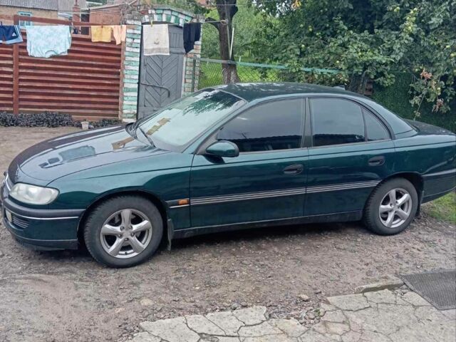 Зеленый Опель Омега, объемом двигателя 2 л и пробегом 350 тыс. км за 1900 $, фото 1 на Automoto.ua