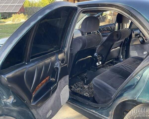 Зеленый Опель Омега, объемом двигателя 2 л и пробегом 350 тыс. км за 2100 $, фото 11 на Automoto.ua