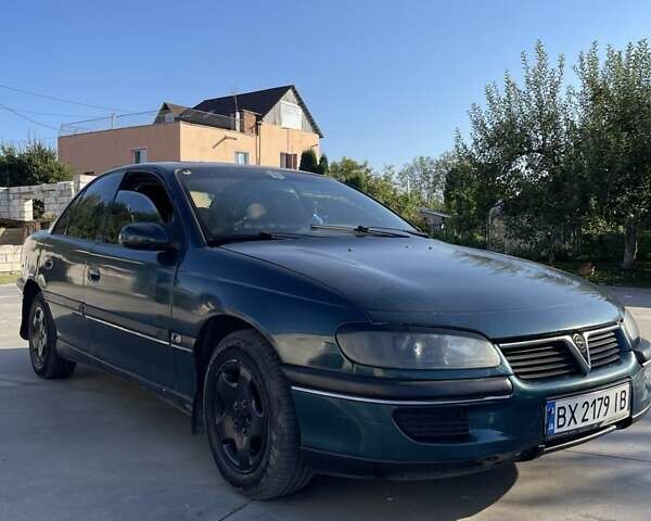 Зеленый Опель Омега, объемом двигателя 2 л и пробегом 350 тыс. км за 2100 $, фото 8 на Automoto.ua