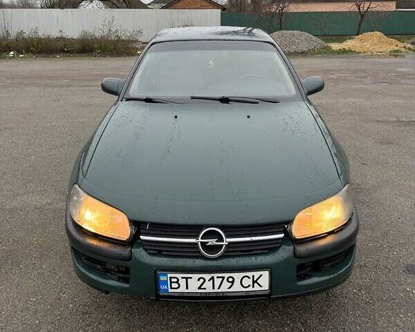 Зелений Опель Омега, об'ємом двигуна 2 л та пробігом 230 тис. км за 1400 $, фото 2 на Automoto.ua
