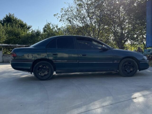 Зеленый Опель Омега, объемом двигателя 2 л и пробегом 300 тыс. км за 1800 $, фото 7 на Automoto.ua