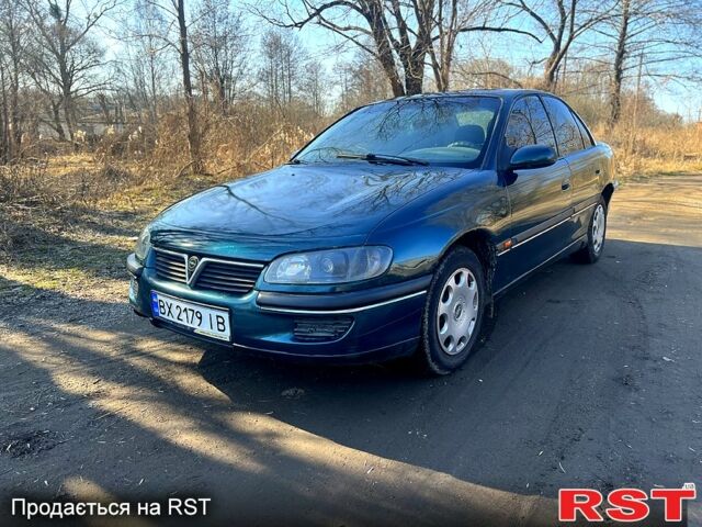 Зелений Опель Омега, об'ємом двигуна 2 л та пробігом 400 тис. км за 1700 $, фото 2 на Automoto.ua