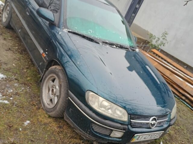Зеленый Опель Омега, объемом двигателя 2 л и пробегом 350 тыс. км за 1700 $, фото 1 на Automoto.ua