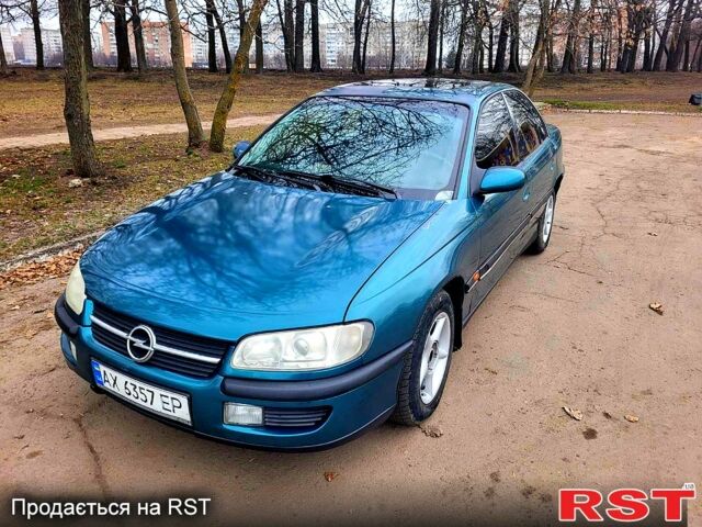 Зеленый Опель Омега, объемом двигателя 2 л и пробегом 350 тыс. км за 2100 $, фото 7 на Automoto.ua