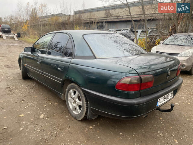 Зелений Опель Омега, об'ємом двигуна 2 л та пробігом 300 тис. км за 1300 $, фото 1 на Automoto.ua