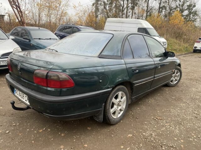 Зеленый Опель Омега, объемом двигателя 2 л и пробегом 200 тыс. км за 1300 $, фото 4 на Automoto.ua