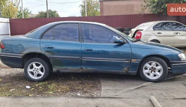 Зелений Опель Омега, об'ємом двигуна 2 л та пробігом 180 тис. км за 650 $, фото 1 на Automoto.ua