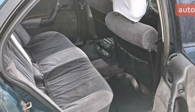 Зелений Опель Омега, об'ємом двигуна 2 л та пробігом 180 тис. км за 650 $, фото 8 на Automoto.ua