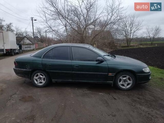 Зеленый Опель Омега, объемом двигателя 2 л и пробегом 400 тыс. км за 850 $, фото 5 на Automoto.ua