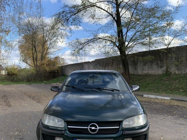 Зелений Опель Омега, об'ємом двигуна 2 л та пробігом 250 тис. км за 1300 $, фото 7 на Automoto.ua