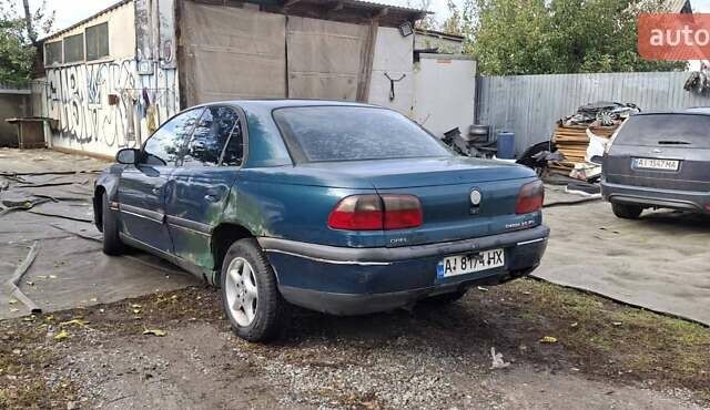 Зелений Опель Омега, об'ємом двигуна 2 л та пробігом 180 тис. км за 650 $, фото 5 на Automoto.ua