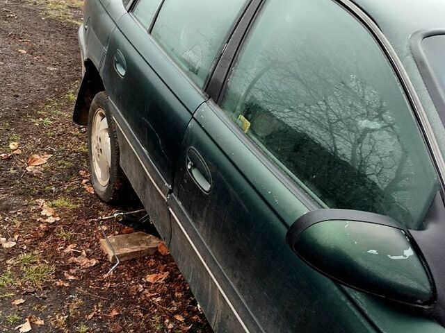 Зеленый Опель Омега, объемом двигателя 2.5 л и пробегом 370 тыс. км за 1050 $, фото 3 на Automoto.ua