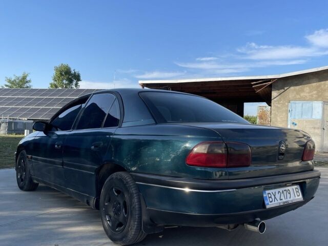 Зеленый Опель Омега, объемом двигателя 2 л и пробегом 300 тыс. км за 1800 $, фото 4 на Automoto.ua