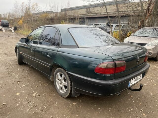 Зеленый Опель Омега, объемом двигателя 2 л и пробегом 200 тыс. км за 1300 $, фото 2 на Automoto.ua
